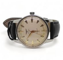 *WITHDRAWN* A LONGINES AUTOMATIC CONQUEST with stainless steel case, cream dial with gold coloured