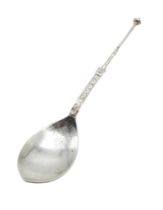 ALEXANDER RITCHIE;  An Iona silver spoon, the petal-shaped bowl with floral decoration, the terminal