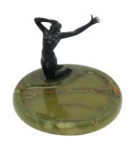 A FRENCH ART DECO BRONZE FIGURE OF A NUDE modelled kneeling with arm outstretched, upon large