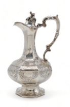 AN EARLY-VICTORIAN SILVER EWER by John & Henry Lias, London 1845, of faceted baluster form, engraved
