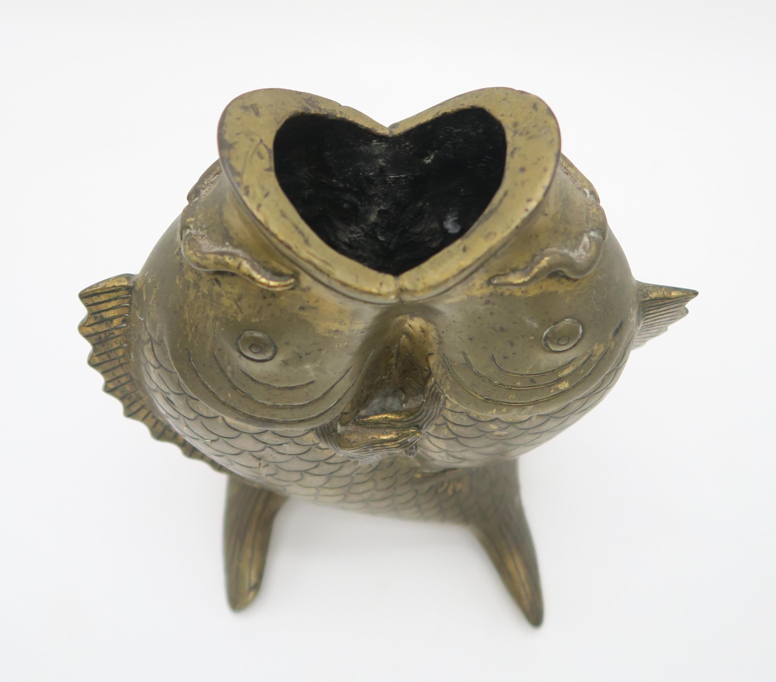 A CHINESE BRASS PEACH INCENSE BURNER With wooden stand, 13 x 20cm, an archaic style vase and - Image 11 of 12