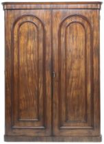 A VICTORIAN MAHOGANY VENEERED AFTER WYLIE & LOCHHEAD TWO DOOR WARDROBE  with moulded cornice over