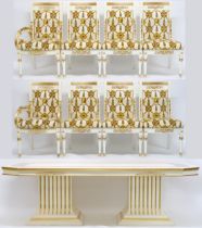 A CONTEMPORARY VERSACE DINING SUITE  consisting of gilt white dining table on twin fluted square