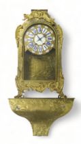 A LARGE FRENCH BRASS TIMEPIECE of Rococo style, the dial with white markers with blue roman