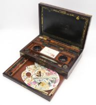 A VICTORIAN BRASS-BOUND ROSEWOOD ARTIST'S PAINT BOX BY REEVES AND SONS, LONDON Containing an array