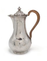 A VICTORIAN SILVER CHOCOLATE POT by Walter Morrisse, London 1859, retailed by Lambert & Rawlings, of