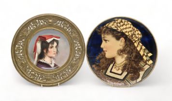 A PORCELAIN PORTRAIT PLAQUE possibly Vienna, painted with a girl's profile, in bronze mount, 31cm