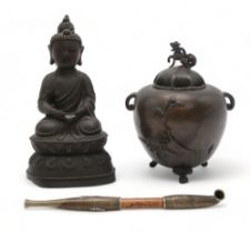 A CHINESE BRONZE MODEL OF BUDDHA Cast in typical design on a high lotus throne base, 21.5cm high,