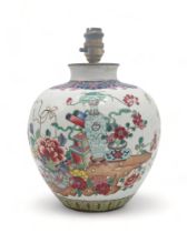 A CHINESE FAMILLE ROSE JAR Painted with precious objects within foliate borders, blue reign mark,