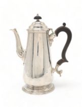 A LATE-VICTORIAN SILVER COFFEE POT by Elkington & Co, London 1896,  in the George III style,