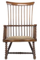 A 19TH CENTURY STAINED ELM DARVEL CHAIR ATTRIBUTED TO JOHN MC MATH  with comb back over hoop arms