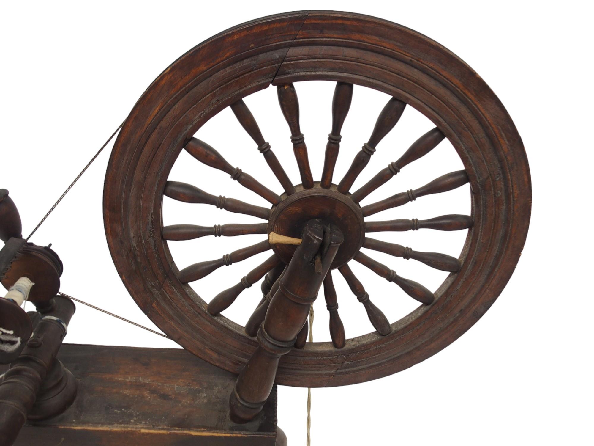 A 19TH CENTURY SCOTTISH SPINING WHEEL  with 56cm turned spindle wheel on turned supports joined by - Image 4 of 6
