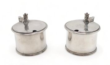 MILITARY INTEREST; A pair of Victorian silver mustard pots, by Samuel Whitford, London 1870, of