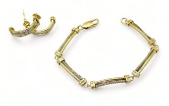 AN ARABIC GOLD SET comprising of bracelet and earrings with white gold cable pattern details. Length