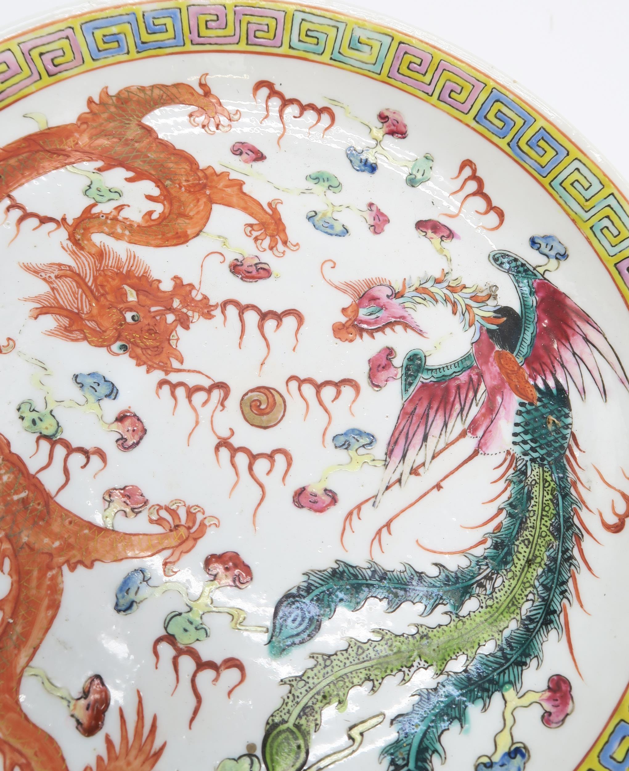 TWO SIMILAR CHINESE DISHES Painted with red dragons and phoenix birds,within key pattern borders, - Image 4 of 9