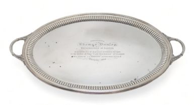 A VICTORIAN SILVER TWIN-HANDLED SERVING TRAY by Barnard Brothers, London 1895, of oval form, with