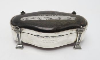 NAVAL INTEREST; A George V silver tortoiseshell presentation casket, by Charles & Richard Comyns,