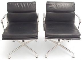 A PAIR OF VITRA EAMES EA 208 SOFT PAD CHAIRS with black soft leather upholstery and chrome open arms