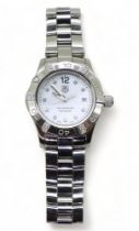 A DIAMOND TAG HEUER AQUARACER this ladies model has a mother of pearl dial and diamond set