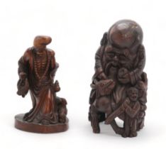 A CHINESE BAMBOO CARVED FIGURE OF SHOULAO Seated on a reclining deer and with attendant, 31cm