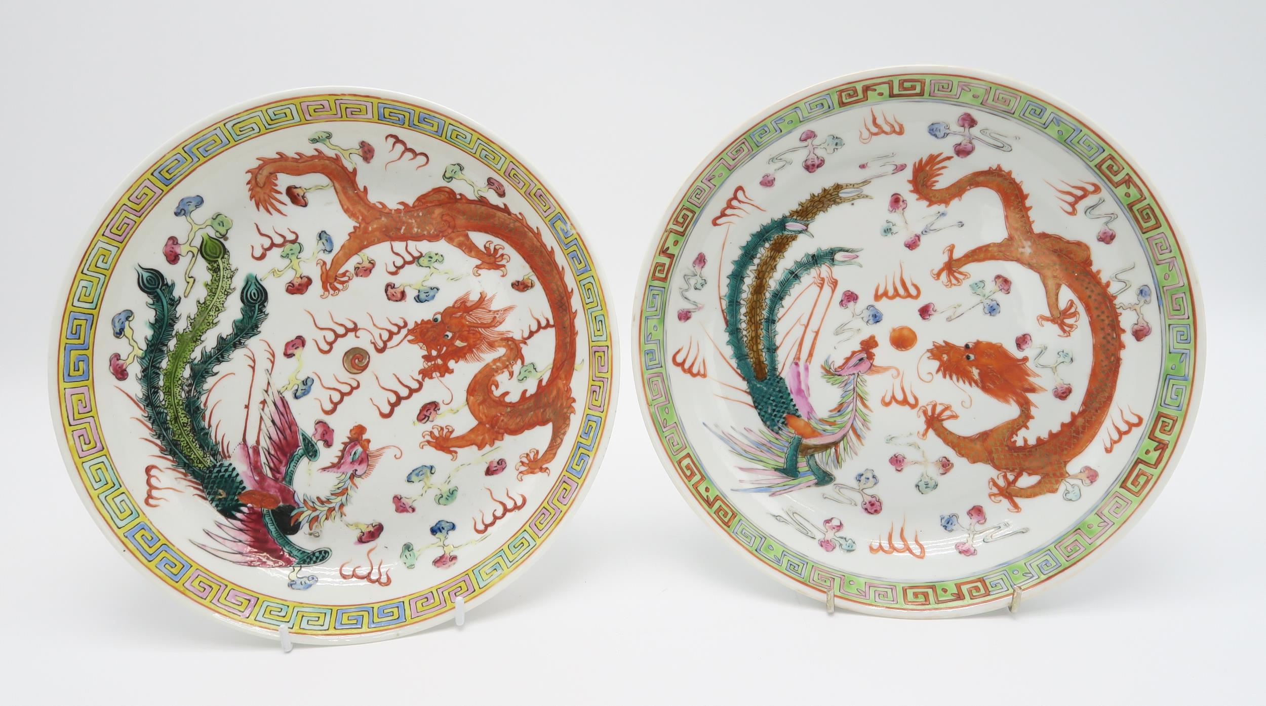 TWO SIMILAR CHINESE DISHES Painted with red dragons and phoenix birds,within key pattern borders, - Image 2 of 9