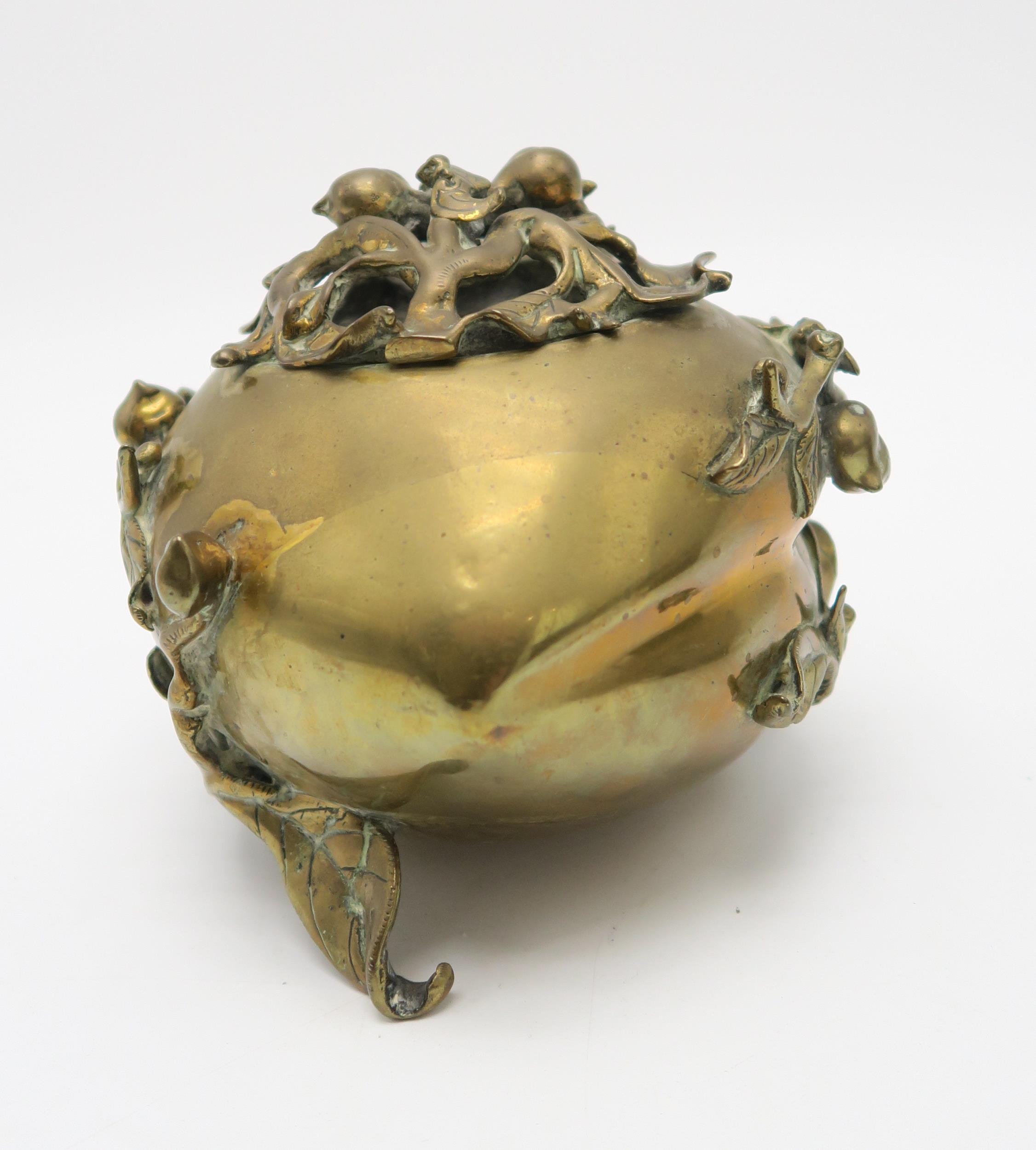 A CHINESE BRASS PEACH INCENSE BURNER With wooden stand, 13 x 20cm, an archaic style vase and - Image 6 of 12