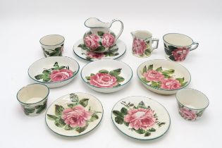 A COLLECTION OF WEMYSS WARE all painted with cabbage roses, including a cup and saucer, two other