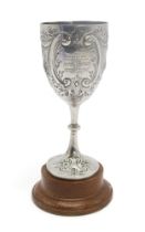 A LATE-VICTORIAN SILVER PRESENTATION GOBLET by James & William Deakin, London 1900, the body with