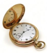 A 9CT WALTHAM POCKET WATCH  a full hunter case, with classic white enamel dial with black roman