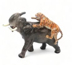 A BESWICK ELEPHANT AND TIGER model no. 1720, 30cm high Condition Report:In good condition