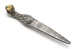 AN UNUSUAL WHITE METAL SGIAN DUBH  The grip hand-chased and modelled as an eagle's claw gripping a