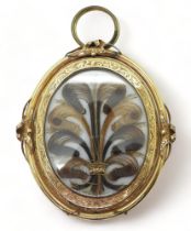 MOURNING PENDANT BROOCH with glazed hair art panel, embellished with gold thread and pearls