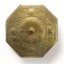 A GLASGOW SCHOOL CELTIC REVIVAL WALL CLOCK of octagonal form with repousse knotwork decoration and