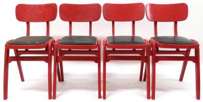 A SET OF FOUR MID 20TH CENTURY AFTER STOE "BEN" STACKING CHAIRS  red painted frames with laminated