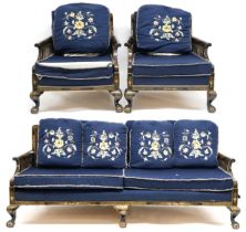 AN EARLY 20TH CENTURY BLACK LACQUER THREE PIECE BERGERE SUITE  comprising three seater settee with