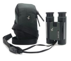 A PAIR OF SWAROVSKI OPTIK CL 8 x 25 BINOCULARS Serial no. G881556417, standing approx. 12cm in