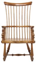 A 19TH CENTURY ELM DARVEL CHAIR ATTRIBUTED TO SHEILDS & SON with comb back over hoop arms with