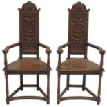 A PAIR OF VICTORIAN OAK CAQUETEUSE ARMCHAIRS  with carved narrow splats over solid seats flanked