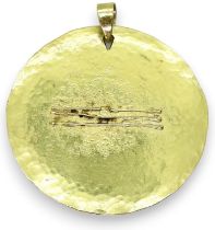 AN 18CT GOLD ABSTRACT PENDANT of disc shape with planished surface. Makers mark BvN, with London