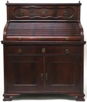 A VICTORIAN MAHOGANY TAMBOUR TOP WRITING DESK  with shaped galleried top over single fitted