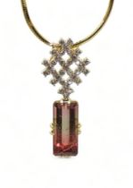 WATERMELON TOURMALINE & DIAMOND PENDANT set with a pink and green emerald cut tourmaline gemstone,