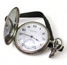 A ULYSSE NARDIN POCKET WATCH in continental silver full hunter case, The white enamelled dial is