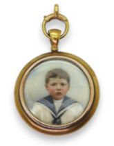 *WITHDRAWN* A DOUBLE SIDED LOCKET with glazed portrait miniatures of children, a little lad in a