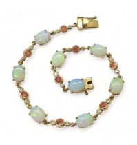 A 9CT GOLD BRACELET set with oval opals and pink and white sapphires, length 19cm, with a heart