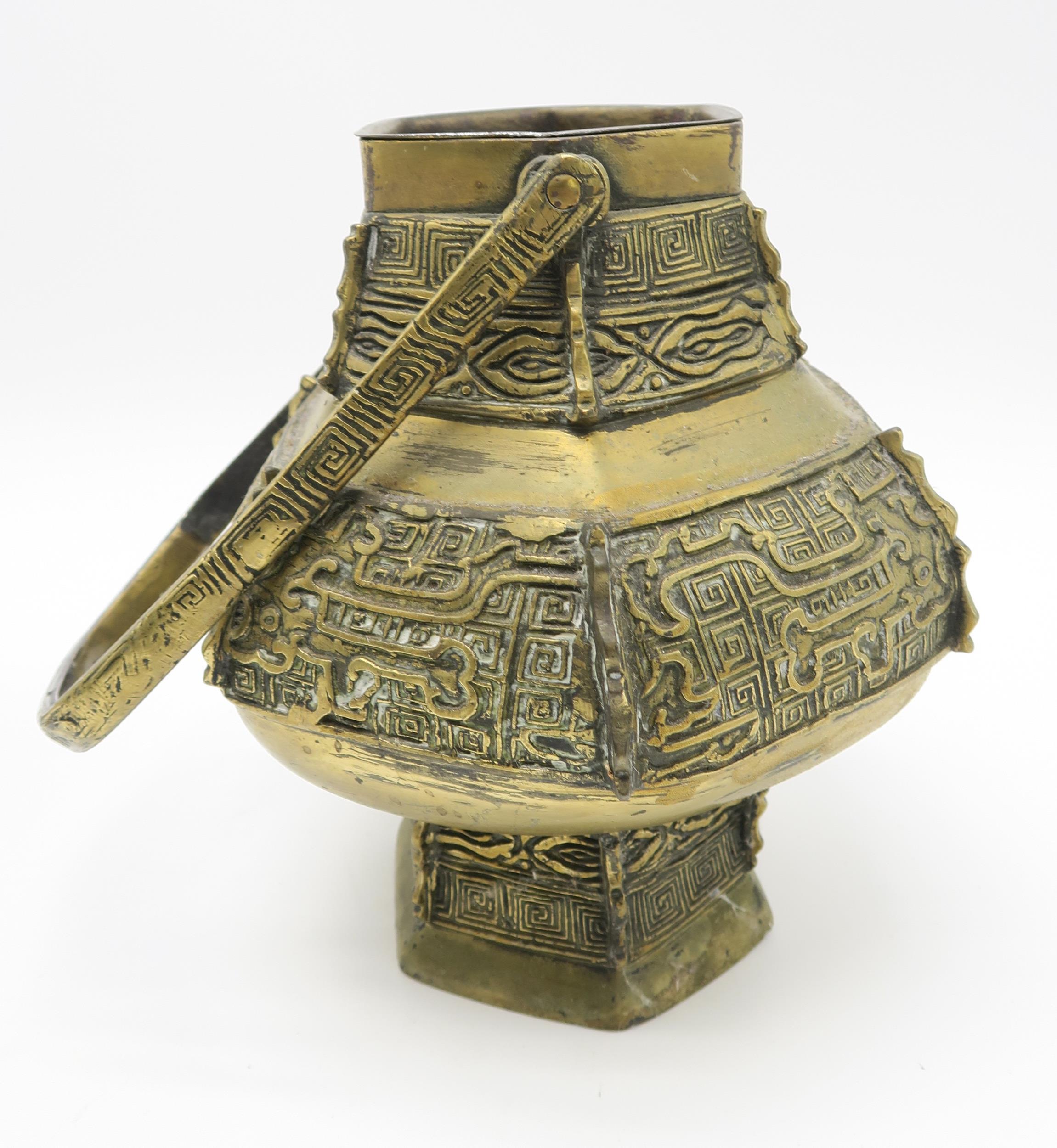 A CHINESE BRASS PEACH INCENSE BURNER With wooden stand, 13 x 20cm, an archaic style vase and - Image 4 of 12