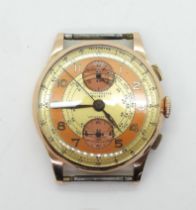 A CHRONOGRAPHE SUISSE WATCH in 18ct gold with Swiss hallmarks. Interesting yellow and orange two