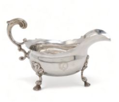 A HEAVY GAUGE GEORGE II SILVER SAUCE BOAT London 1755, maker's mark I.?, engraved with a crest and