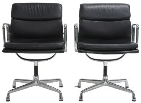 A PAIR OF VITRA EAMES EA 208 SOFT PAD CHAIRS with black soft leather upholstery and chrome open arms