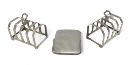 A pair of silver four division toast racks, Birmingham 1912, and a silver cigarette case, by