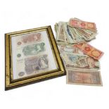 A mixed lot of worldwide banknotes  Condition Report:Available upon request